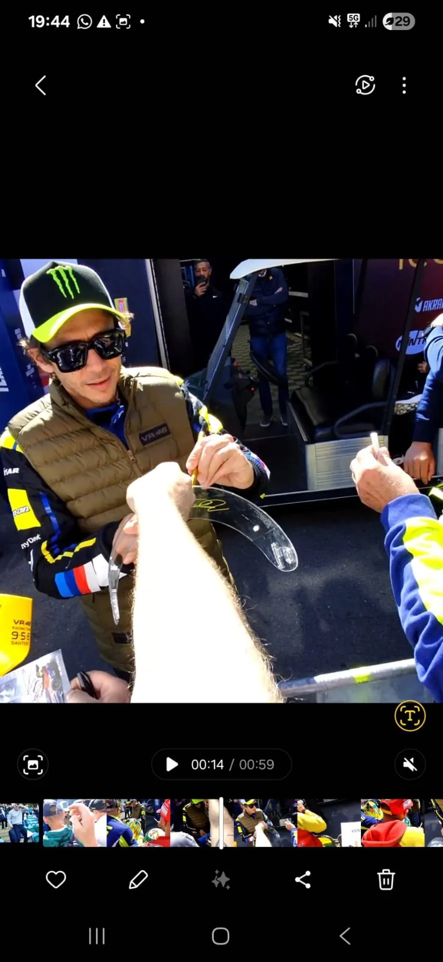 Valentino Rossi signing a visor